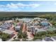 Aerial view of Celebration's town center, with shops and parking areas at 1054 Waterside Dr, Celebration, FL 34747