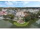 Aerial view of Celebration town center, featuring a lake, shops, and a movie theater at 1054 Waterside Dr, Celebration, FL 34747