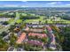 Aerial view of community near golf course and highway at 1054 Waterside Dr, Celebration, FL 34747