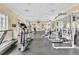 Well-equipped fitness center with cardio and weight machines at 1054 Waterside Dr, Celebration, FL 34747