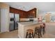 Modern kitchen with stainless steel appliances and granite countertops at 1054 Waterside Dr, Celebration, FL 34747