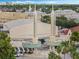 Celebration movie theater, art deco style, with palm trees at 1054 Waterside Dr, Celebration, FL 34747