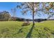 Relaxing picnic area by a lake with wooden benches at 1054 Waterside Dr, Celebration, FL 34747