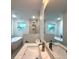 Spa-like bathroom with soaking tub, double vanity and walk-in shower at 1115 Munster Ct, Kissimmee, FL 34759
