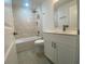 Simple bathroom with a single vanity and tub shower combo at 1115 Munster Ct, Kissimmee, FL 34759