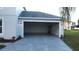 Attached garage with epoxy flooring and new construction at 1115 Munster Ct, Kissimmee, FL 34759