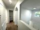Clean hallway with ample storage and linen closet at 1115 Munster Ct, Kissimmee, FL 34759