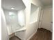 Upstairs hallway showcasing stylish architectural details at 1115 Munster Ct, Kissimmee, FL 34759