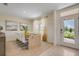 Spacious dining room with large windows and a modern dining table at 1778 Three Bars Rd, Kissimmee, FL 34744