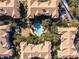 Complex aerial view, showing building layout and community pool at 3344 Robert Trent Jones Dr # 40305, Orlando, FL 32835