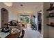 Spacious living room with black leather sofa and indoor plants at 3344 Robert Trent Jones Dr # 40305, Orlando, FL 32835