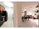Open concept kitchen, dining and living area with modern design at 3344 Robert Trent Jones Dr # 40305, Orlando, FL 32835