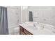 Bathroom with tub shower combo, toilet and a vanity at 4481 Monado Dr, Kissimmee, FL 34746