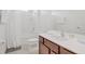 Bathroom with tub shower combo, toilet and a vanity at 4481 Monado Dr, Kissimmee, FL 34746