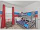 Fun bedroom with bunk beds and superhero theme at 4481 Monado Dr, Kissimmee, FL 34746