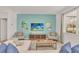 Living room with a sectional sofa, two armchairs, and a large-screen TV at 4481 Monado Dr, Kissimmee, FL 34746
