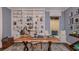 Home office with built-in bookshelves, a wooden desk, and decorative accents at 851 Arbor Green Trl, St Cloud, FL 34771