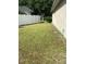 Backyard with grassy area and privacy fence at 912 Hire Cir, Ocoee, FL 34761