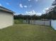 Large backyard with grassy area and privacy fence at 912 Hire Cir, Ocoee, FL 34761