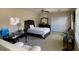 Bright bedroom with a double bed and workspace at 912 Hire Cir, Ocoee, FL 34761