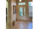 Bright and airy entryway with tile flooring and access to other rooms at 912 Hire Cir, Ocoee, FL 34761
