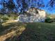 Back of house with large yard at 912 Hire Cir, Ocoee, FL 34761