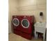 Laundry room with washer, dryer, and utility sink at 912 Hire Cir, Ocoee, FL 34761