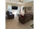 Relaxing living room with large screen TV and comfortable seating at 912 Hire Cir, Ocoee, FL 34761