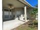 Covered patio with ceiling fan, offering backyard access at 912 Hire Cir, Ocoee, FL 34761