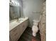 Modern bathroom with white vanity and gold accents at 1023 S Hiawassee Rd # 4022, Orlando, FL 32835