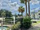 View of tennis court and surrounding landscape at 1023 S Hiawassee Rd # 4022, Orlando, FL 32835