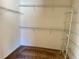 Large walk-in closet with wire shelving at 13115 Point O Wood Ct Ct, Orlando, FL 32828