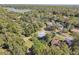 Aerial view showcasing the house's location in a wooded neighborhood at 1468 Deer Lake Cir, Apopka, FL 32712