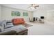 Open and airy bonus room with ample space for lounging and dining at 17835 Olive Oak Way, Orlando, FL 32820