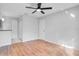 Bright bedroom with hardwood floors, double closets and ceiling fan at 2223 Stonington Ave # 2223, Orlando, FL 32817