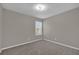 Spacious bedroom with neutral walls and carpet at 2235 Mallory Cir, Haines City, FL 33844