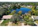 Aerial view showing home near a serene lake at 304 N Lakeview Dr, Longwood, FL 32750