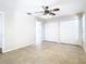 Primary bedroom with tile floors and double closets at 304 N Lakeview Dr, Longwood, FL 32750