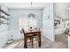 Cozy dining area with a wood table and chairs, and built-in shelving at 328 Springview Dr, Sanford, FL 32773