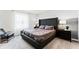 Spacious bedroom with a large bed and plenty of light at 3337 Private Oak Dr, Apopka, FL 32703