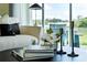 Coffee table with books and candles, next to a couch with a view at 3337 Private Oak Dr, Apopka, FL 32703