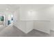 Upstairs hallway with carpet and doors to bedrooms at 3337 Private Oak Dr, Apopka, FL 32703