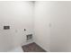 Laundry room with hookups and built-in shelving at 3337 Private Oak Dr, Apopka, FL 32703