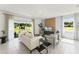 Bright living room with sliding glass doors and a view of the backyard at 3337 Private Oak Dr, Apopka, FL 32703