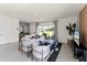 Spacious living room with large windows and access to the backyard at 3337 Private Oak Dr, Apopka, FL 32703