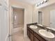 Bathroom with double vanity and tub shower combo at 4718 Rockvale Dr, Kissimmee, FL 34758