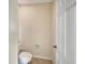 Small half bathroom with toilet and sink at 4718 Rockvale Dr, Kissimmee, FL 34758