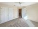 Bedroom with double doors and access to another room at 4718 Rockvale Dr, Kissimmee, FL 34758