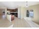 Kitchen with dark wood cabinets, granite counters, and stainless steel appliances at 4718 Rockvale Dr, Kissimmee, FL 34758