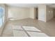 Spacious living room with tile floors and access to other rooms at 4718 Rockvale Dr, Kissimmee, FL 34758